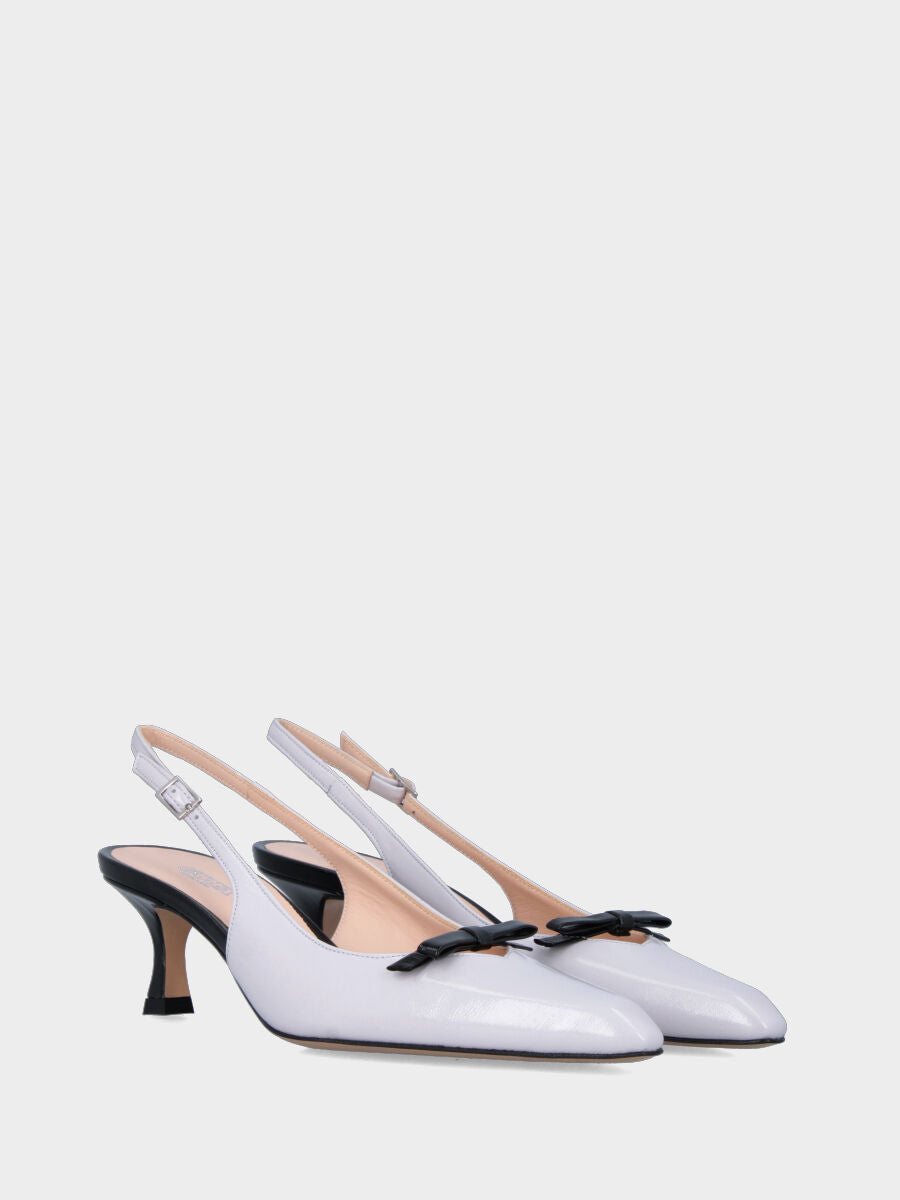 Slingback in verlux bianco con tacco e fiocchetto a contrasto