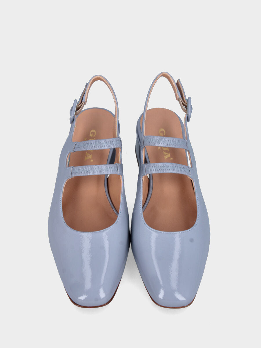 Slingback in verlux celeste con cinturini doppi e tacco a blocco