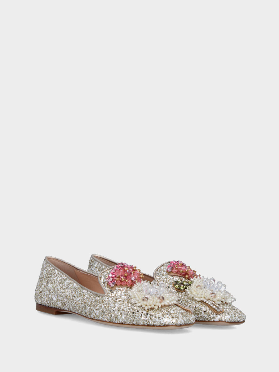 Ballerina con glitter platino e applicazioni ornamentali sulla pianta