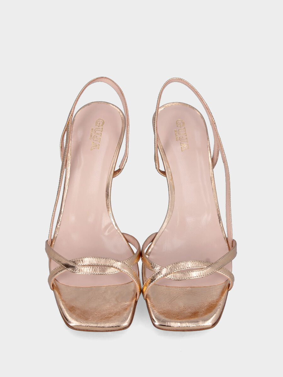 Sandalo in laminato beige con listini incrociati e tacco a calice